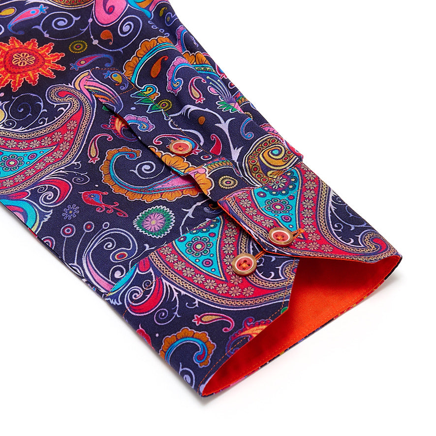 Colorful paisley-patterned shirt with a orange contrast  cuff on a white background
