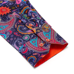 
            
                Load image into Gallery viewer, Colorful paisley-patterned shirt with a orange contrast  cuff on a white background
            
        